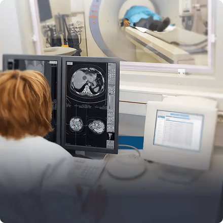 Doctor performing diagnostic imaging on a patient in a radiology